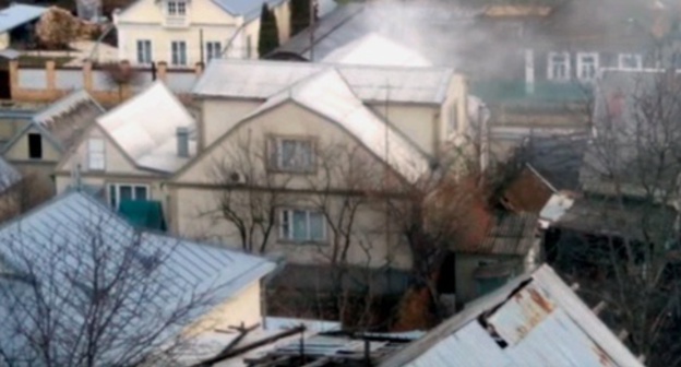 Место проведения спецоперации на улице Циолковского в Нальчике. 15 января 2016 года. Фото: скриншот из видеозаписи очевидца спецоперации, Youtube.com