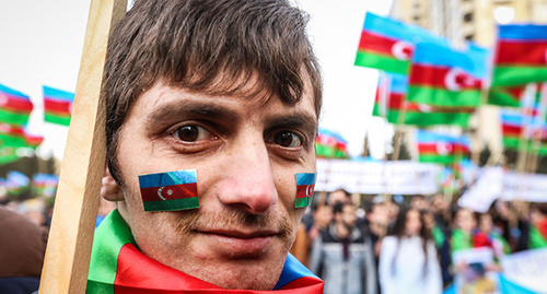 Участник антикризисного митинга в Баку. 15 марта 2015 г. Фото Азиза Каримова для "Кавказского узла"