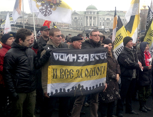 Участники акции националистов за отмену выборов и "за свободу узникам Манежки". Москва, 11 декабря 2011 г. Фото Юлии Буславской для "Кавказского узла" Участники акции националистов за отмену выборов и "за свободу узникам Манежки". Москва, 11 декабря 2011 г. Фото Юлии Буславской для "Кавказского узла"