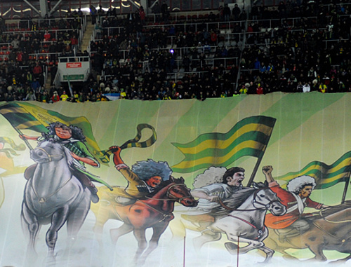 Баннер фан-движения "Дикая Дивизия". Фото пресс-службы ФК "Анжи", fc-anji.ru Баннер фан-движения "Дикая Дивизия". Фото пресс-службы ФК "Анжи", fc-anji.ru