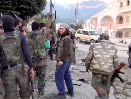 Боевики в провинции Латакия, Сирия. 25 марта 2014 г. Кадр из видео? размещенного на YouTube, http://www.youtube.com/watch?v=ER5H2Thyf5g Боевики в провинции Латакия, Сирия. 25 марта 2014 г. Кадр из видео? размещенного на YouTube, http://www.youtube.com/watch?v=ER5H2Thyf5g