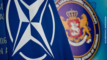 Символика НАТО и Грузии. Фото Александра Имедашвили, NEWSGEORGIA, http://www.newsgeorgia.ru/politics/20140904/216927102.html Символика НАТО и Грузии. Фото Александра Имедашвили, NEWSGEORGIA, http://www.newsgeorgia.ru/politics/20140904/216927102.html
