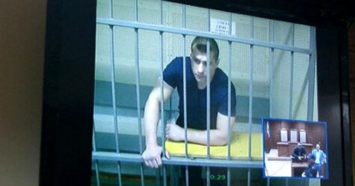 Саид Османов во время суда. Фото http://riakalm.ru/news/law/2986-segodnya-v-eliste-rassmotryat-delo-bortsa-iz-dagestana-saida-osmanova Саид Османов во время суда. Фото http://riakalm.ru/news/law/2986-segodnya-v-eliste-rassmotryat-delo-bortsa-iz-dagestana-saida-osmanova