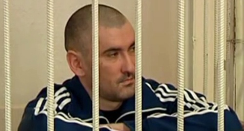 Руслан Рахаев на суде. Скриншот из сюжета телекомпании "Черкесск", ноябрь 2012 года. Youtube.com/watch?v=fWSHY_RWWCk Руслан Рахаев на суде. Скриншот из сюжета телекомпании "Черкесск", ноябрь 2012 года. Youtube.com/watch?v=fWSHY_RWWCk