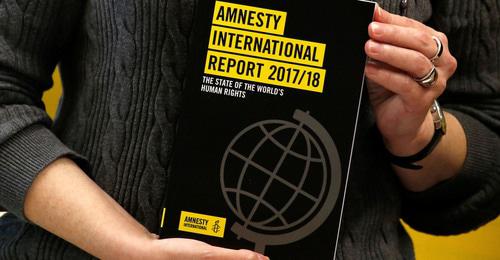Отчет Amnesty International. Фото: REUTERS/Bobby Yip Отчет Amnesty International. Фото: REUTERS/Bobby Yip