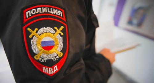 Шеврон на форме сотрудника полиции. Фото Максим Тишин / Югополис
Шеврон на форме сотрудника полиции. Фото Максим Тишин / Югополис