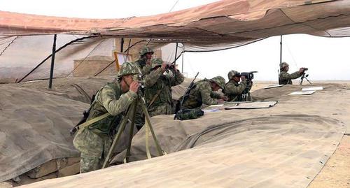 Азербайджанские военные на учениях. Ноябрь 2018 года. Фото с сайта Минобороны Азербайджана. https://mod.gov.az/ru/news/v-ramkah-kshvi-vojska-nahchyvanskogo-garnizona-uspeshno-proveli-etap-s-boevoj-strelboj-video-24912.html Азербайджанские военные на учениях. Ноябрь 2018 года. Фото с сайта Минобороны Азербайджана. https://mod.gov.az/ru/news/v-ramkah-kshvi-vojska-nahchyvanskogo-garnizona-uspeshno-proveli-etap-s-boevoj-strelboj-video-24912.html