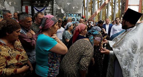 Траурные мероприятия по погибшим. Беслан, 3 сентября 2019 г. Фото: REUTERS/Eduard Korniyenko Траурные мероприятия по погибшим. Беслан, 3 сентября 2019 г. Фото: REUTERS/Eduard Korniyenko