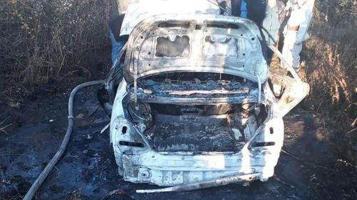 Автомобиль стрелявших по летнему кафе "Сан-Ремо" в Сухуме, найденый сгоревшим. Фото: Милиция Абхазии. https://www.facebook.com/MVD.Abkhazia/ Автомобиль стрелявших по летнему кафе "Сан-Ремо" в Сухуме, найденый сгоревшим. Фото: Милиция Абхазии. https://www.facebook.com/MVD.Abkhazia/