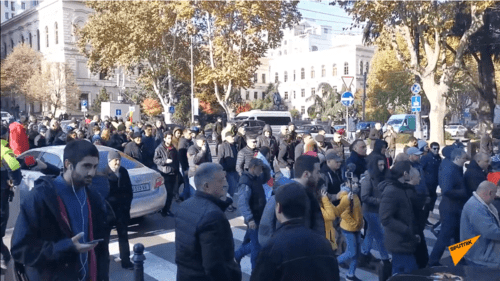 Акция протеста у Национальной библиотеки
Грузии 29 ноября 2019 года. Стоп-кадр видео "Sputnik-Грузия" https://sputnik-georgia.ru/video/20191129/247144476/Oppozitsiya-v-ocherednoy-raz-popytalas-pomeshat-rabote-parlamenta-Gruzii-video.html Акция протеста у Национальной библиотеки
Грузии 29 ноября 2019 года. Стоп-кадр видео "Sputnik-Грузия" https://sputnik-georgia.ru/video/20191129/247144476/Oppozitsiya-v-ocherednoy-raz-popytalas-pomeshat-rabote-parlamenta-Gruzii-video.html