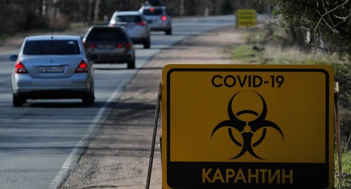 Щит с информацией о карантине. Май 2020 г. Фото: REUTERS/Anton Vaganov Щит с информацией о карантине. Май 2020 г. Фото: REUTERS/Anton Vaganov