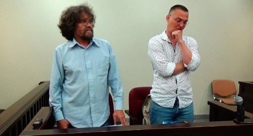 Андрей Рудомаха и Михаил Беньяш заслушивают решение о признании обыска 30.07.2019г. незаконным
. Фото пресс-службы "Эковахты" http://ewnc.org/node/28175. Андрей Рудомаха и Михаил Беньяш заслушивают решение о признании обыска 30.07.2019г. незаконным
. Фото пресс-службы "Эковахты" http://ewnc.org/node/28175.