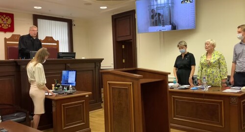 Оглашение постановления Верховного суда об изменении подсудности рассмотрения апелляционных жалоб Дмитрия Новикова 28 июня 2021 года. Стоп-кадр из видео https://www.youtube.com/watch?v=7hsCc0hlAjo. Оглашение постановления Верховного суда об изменении подсудности рассмотрения апелляционных жалоб Дмитрия Новикова 28 июня 2021 года. Стоп-кадр из видео https://www.youtube.com/watch?v=7hsCc0hlAjo.