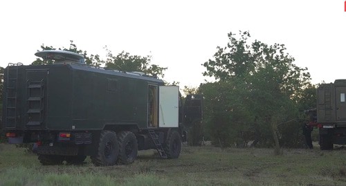 Спецтехника во время проведения КТО силовиками в лесу неподалеку от села Талги. Кадр видео Национальный антитеррористический комитет Спецтехника во время проведения КТО силовиками в лесу неподалеку от села Талги. Кадр видео Национальный антитеррористический комитет
