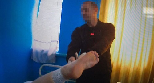 Стоп-кадр видео пыток. Правозащитный проект Gulagu.net Стоп-кадр видео пыток. Правозащитный проект Gulagu.net