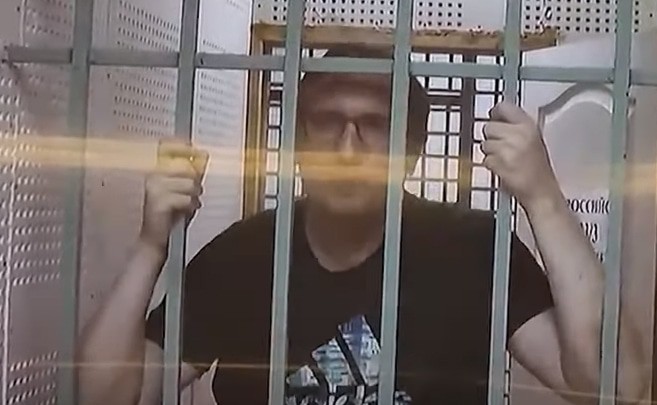 Дмитрий Новиков. Скриншот видео "Кавказского узла" https://www.youtube.com/watch?v=Y_frtEWrPeg Дмитрий Новиков. Скриншот видео "Кавказского узла" https://www.youtube.com/watch?v=Y_frtEWrPeg