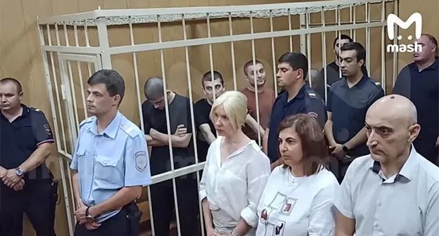 Вынесение приговора по делу о погроме в аэропорту Махачкалы. Скриншот видео страницы вКонтакте Mash от 23 августа 2024 г. https://vk.com/wall-112510789_11536997 Вынесение приговора по делу о погроме в аэропорту Махачкалы. Скриншот видео страницы вКонтакте Mash от 23 августа 2024 г. https://vk.com/wall-112510789_11536997