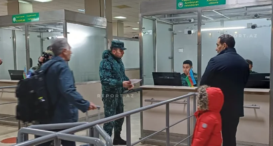 Эвакуация граждан Азербайджана. Скриншот фото Report от 28.02.26, https://report.az/ru/v-regione/iz-irana-evakuirovany-sem-grazhdan-azerbajdzhana#gallery_2ccea511d66872c3920270055b43d44a-8 Эвакуация граждан Азербайджана. Скриншот фото Report от 28.02.26, https://report.az/ru/v-regione/iz-irana-evakuirovany-sem-grazhdan-azerbajdzhana#gallery_2ccea511d66872c3920270055b43d44a-8